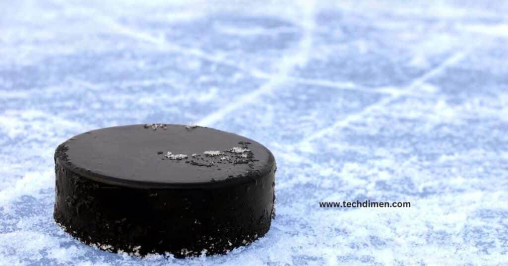 Four Hockey Pucks (Stacked)